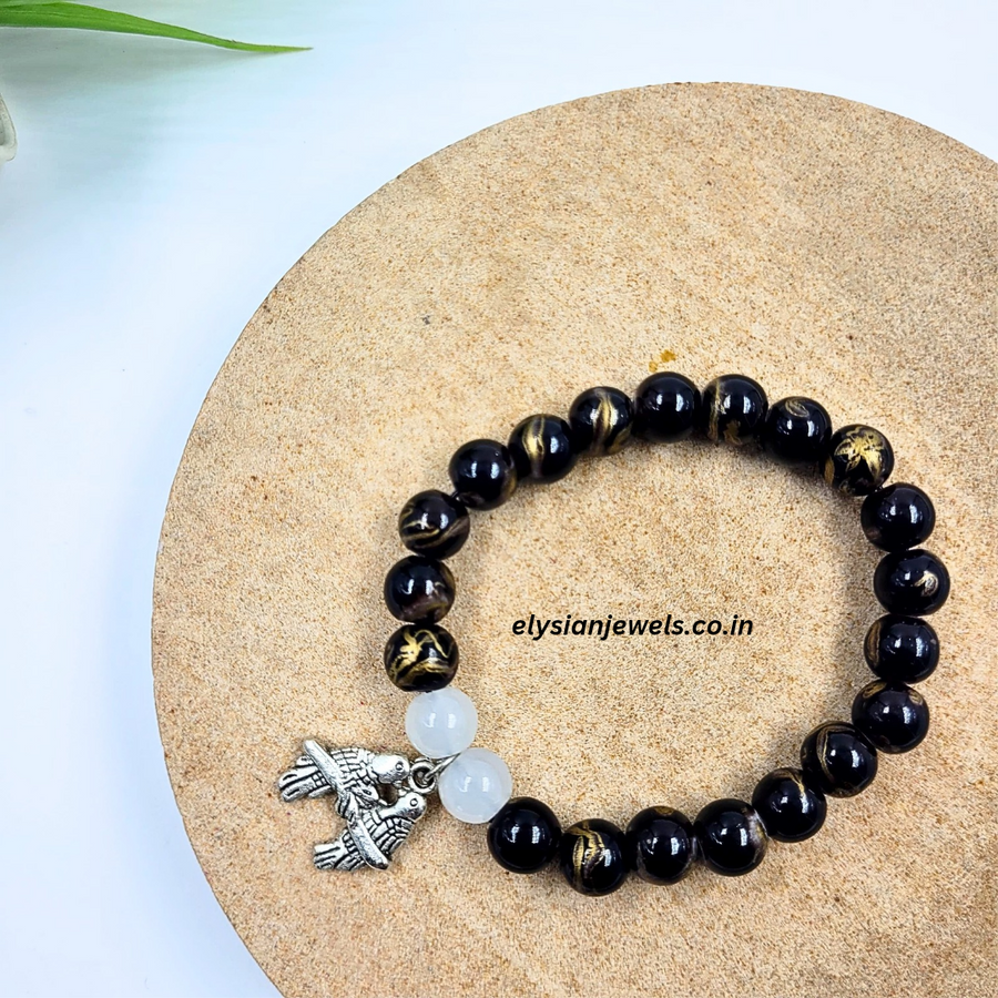 Birds Charm, White Beads With Black Marble Beads Bracelet