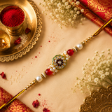 Yellow And Maroon Thread, Pearl And Red Beads With Round Maroon Kundan Rakhi