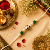 White Thread, Pearl And Green Beads With White Lotus Kundan Rakhi