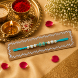 Sky Blue Thread, Pearl With Sky Blue Charm Rakhi