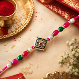 Rani Pink Thread, Pearl, Green And Rani Pink Beads With Square Meenakari Kundan Rakhi